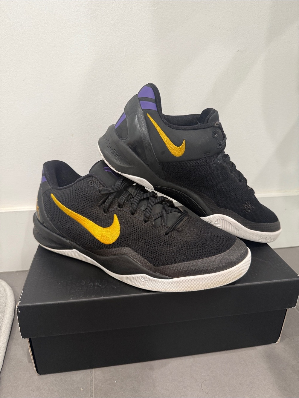 Nike Black Basketball Sneakers with Yellow Swoosh and Purple Heel Accents